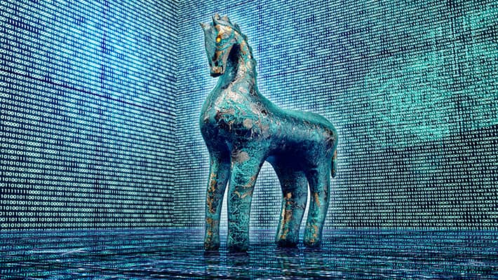 What is a Trojan horse and what damage can it do?